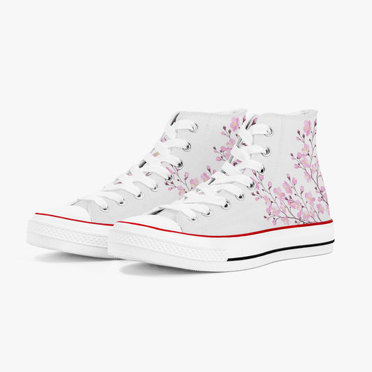 White high-top sneakers with pink floral design on a white background