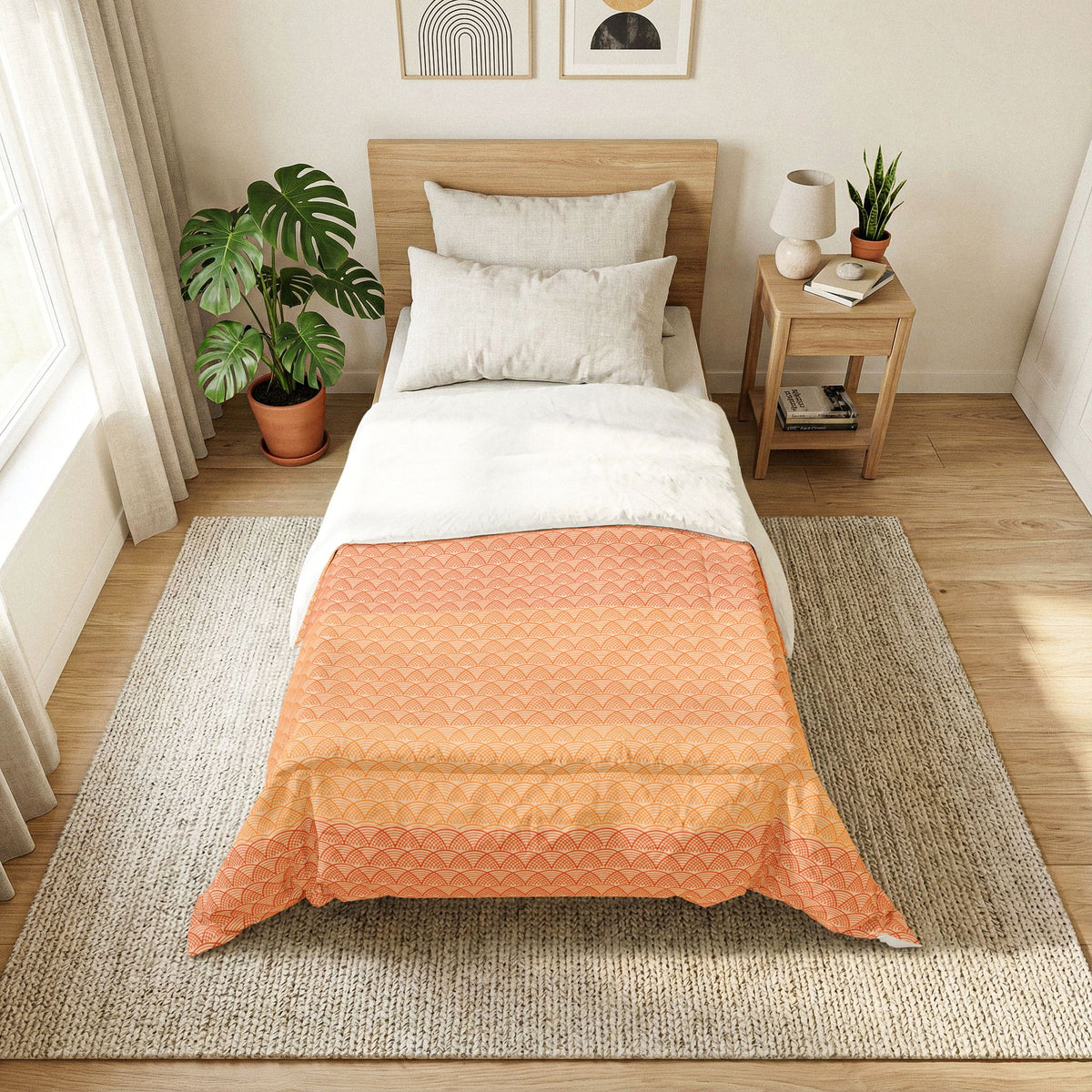 Bedroom with a bed covered by an orange quilt, nightstand, and decor items. Heritage Cotton
