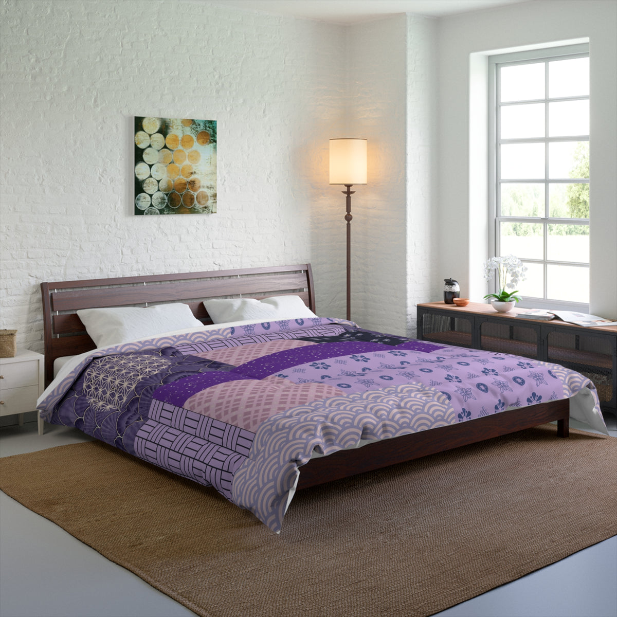Bedroom with a bed featuring a purple and white patterned comforter, wooden headboard, and side tables.