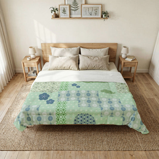 Bedroom with a bed featuring a green floral patterned cotton quilt.