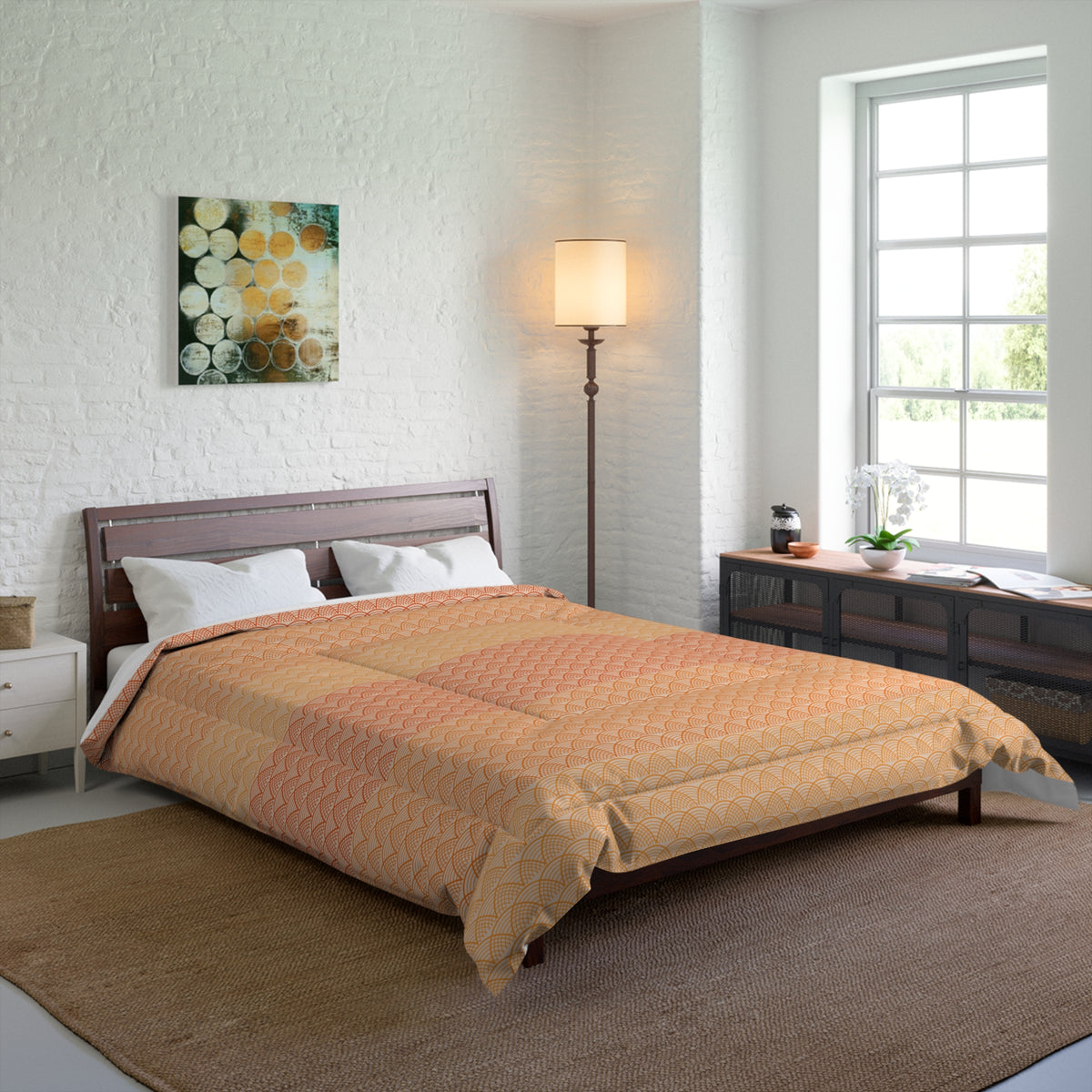 Bedroom with a bed covered in a beige comforter, a lamp, and a painting on the wall.