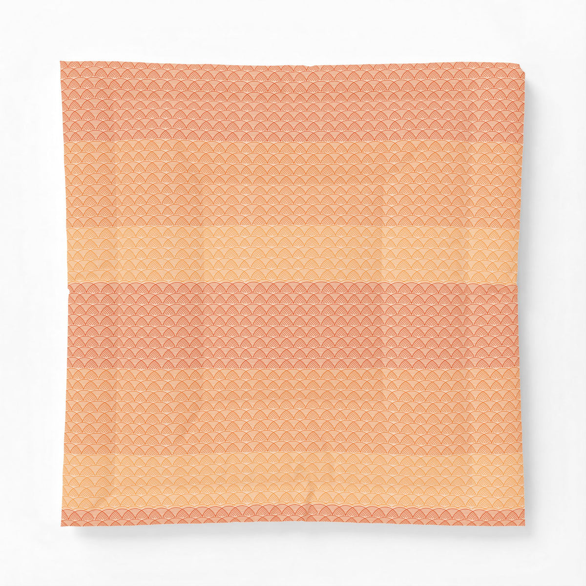 Patterned fabric swatch with a gradient from peach to pink on a white background. Heritage Cotton