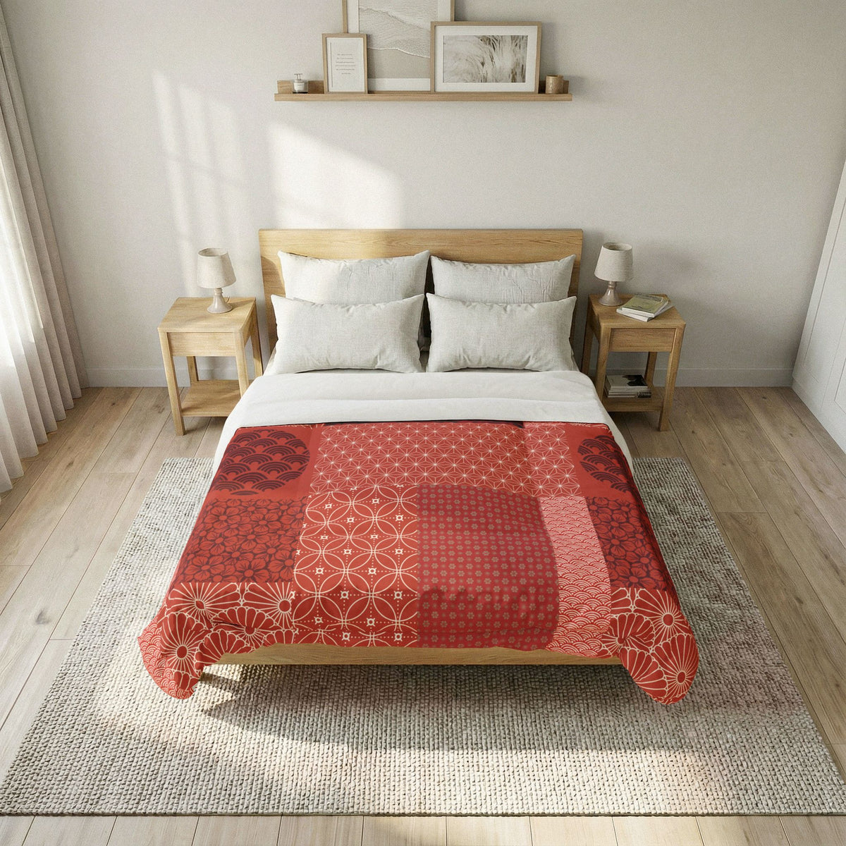 Bedroom with a bed featuring a red and white patterned comforter. Cotton Heritage