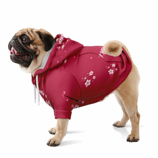 A dog wearing a premium deep magenta athletic zip-up hoodie featuring a vibrant white and pink Sakura cherry blossom pattern, inspired by contemporary Japanese art