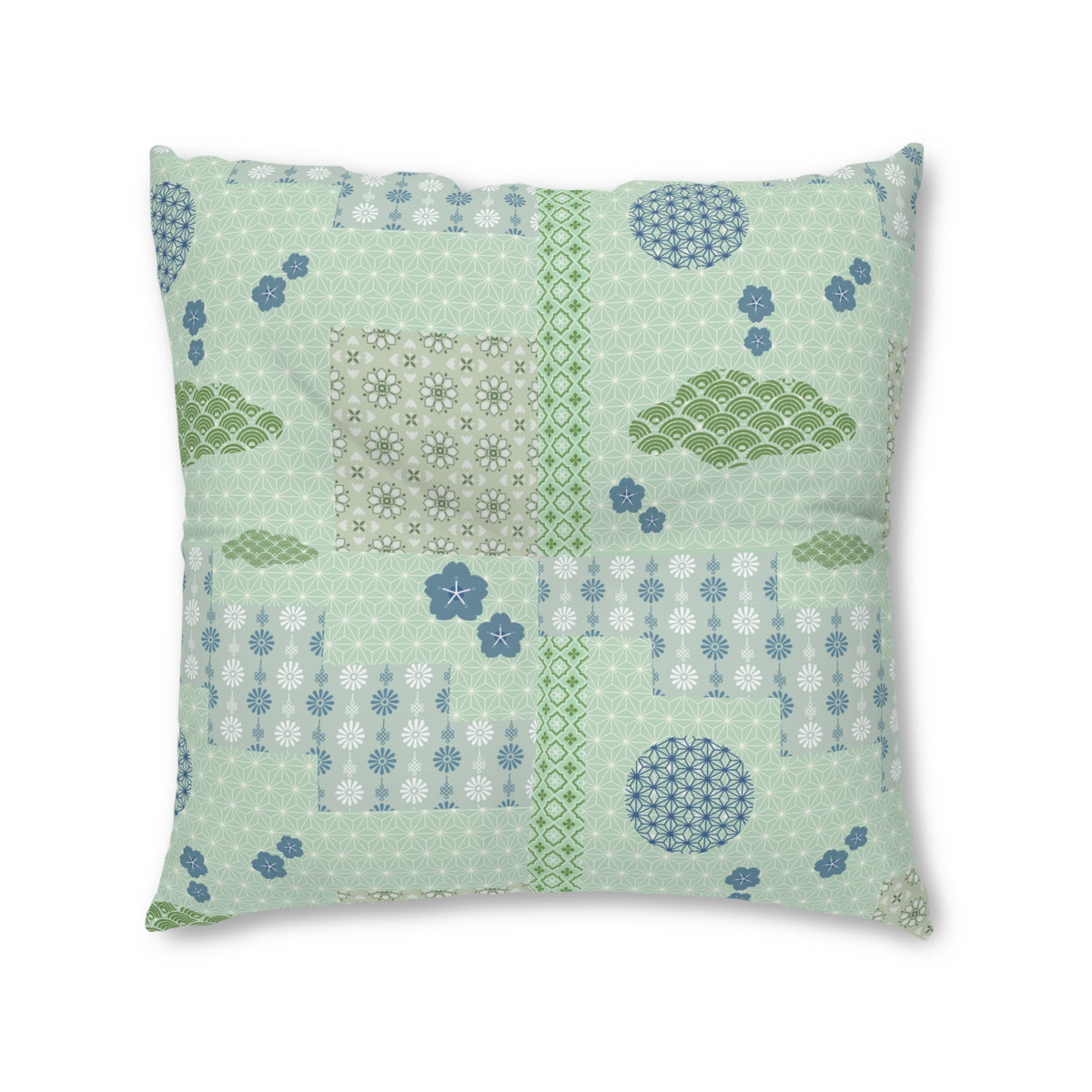 A square decorative throw pillow featuring a light mint green patchwork design with various Japanese-inspired patterns, including floral motifs, wave designs, and geometric borders in shades of green, blue, and white.