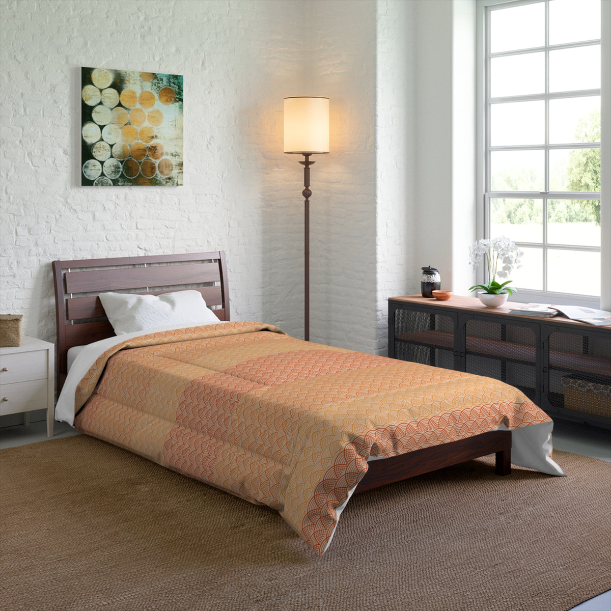 Bedroom with a bed covered in a brown and orange checkered comforter, a lamp, and a painting on the wall.