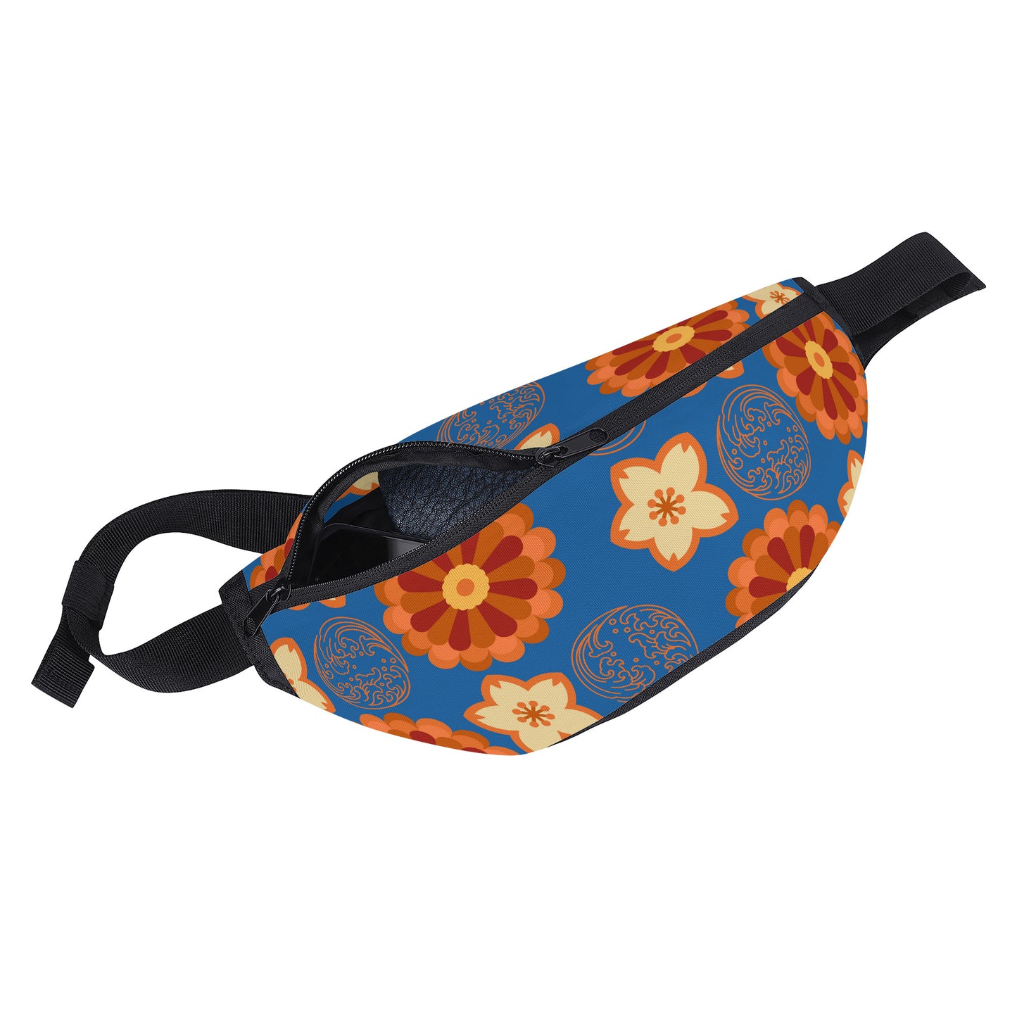 A vibrant blue fanny pack or waist bag lies on a plain gray surface, presented at a slight angle. The bag is adorned with a bold, repeating pattern of stylized orange and cream-colored Japanese flowers, along with subtle dark orange circular motifs resembling traditional family crests (mon) or patterns. It features a black zipper with two pull tabs, and a black adjustable strap with a buckle.