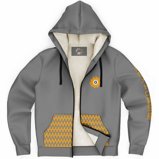 "Grey ultra-soft microfleece zip hoodie with a patterned lining, orange Japanese text on the sleeve, and an orange 'G' logo, inspired by the Tokyo Metro Ginza Line."