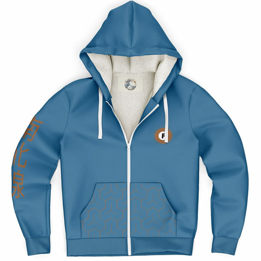 "Blue ultra-soft microfleece zip hoodie with a patterned lining, orange Japanese text on the sleeve, and an orange 'F' logo, inspired by the Tokyo Metro Fukutoshin Line."