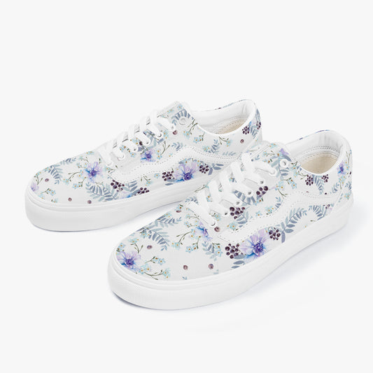 White sneakers with floral pattern on a white background