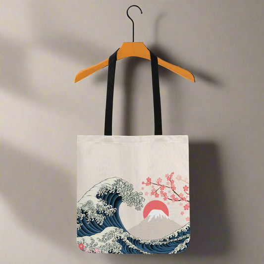 Blue and pink Hokusai Great Wave Off Kanagawa canvas tote bag with Sakura flower accents for carrying groceries.