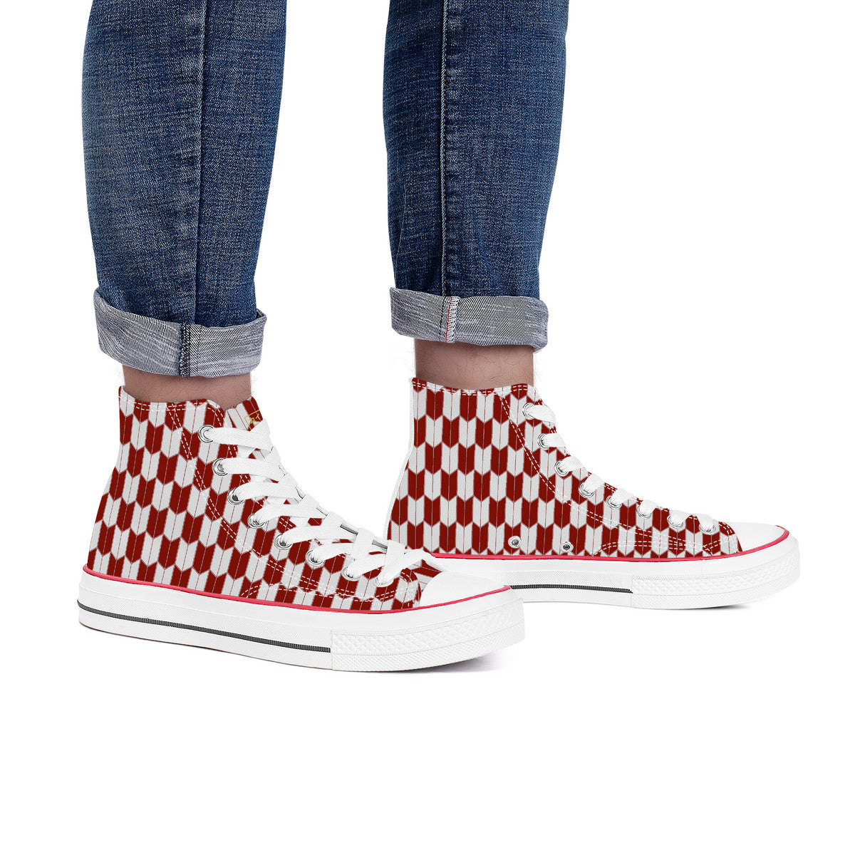 Red and white checkered high-top sneakers worn with rolled-up jeans on a white background