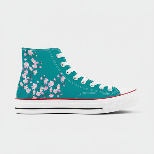 A pair of high-top canvas shoes featuring a cherry blossom design in pink on a white background.