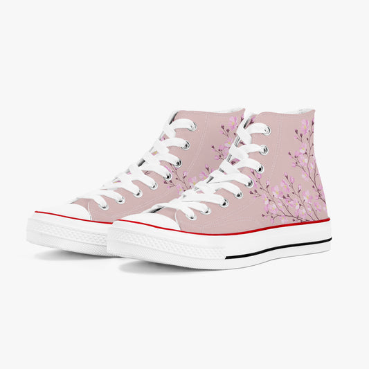 Pink high-top sneakers with floral design on a white background