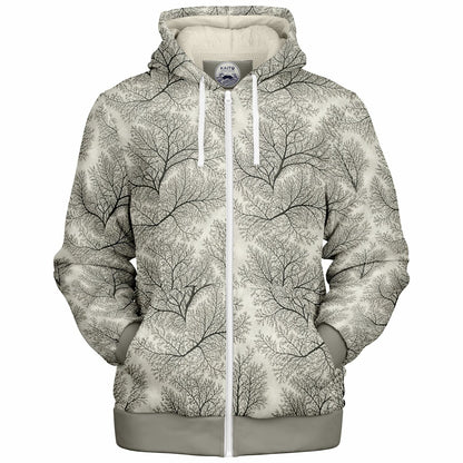 A zip-up hoodie featuring an all-over black tree branch pattern on a warm off-white background, with a solid gray ribbed hem and cuffs, white drawstrings, and a white front zipper.