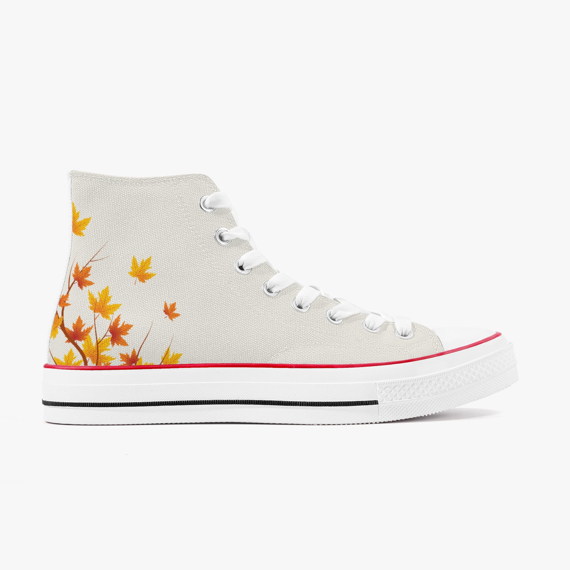 A high-top canvas sneaker in off-white, decorated with a graphic of orange and yellow autumn maple leaves on the heel. It features white laces, a white rubber toe cap with a thin red stripe, and a white midsole with a black line.