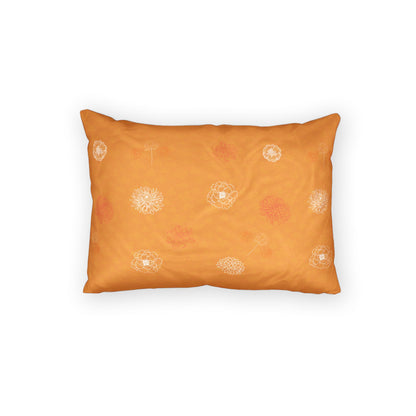 An orange rectangular pillowcase featuring a dandelion pattern in white and muted orange, shown against a plain white background.
