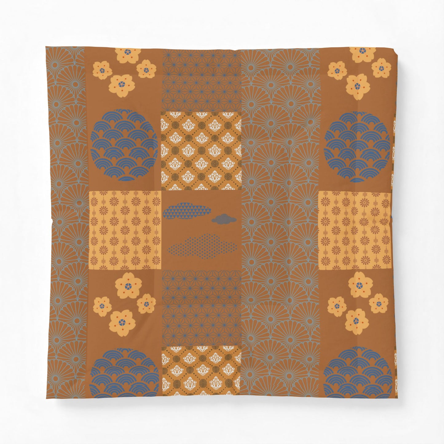 Patterned fabric with a patchwork design on a white background. Heritage Cotton