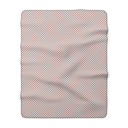 Textured pink blanket on a white background