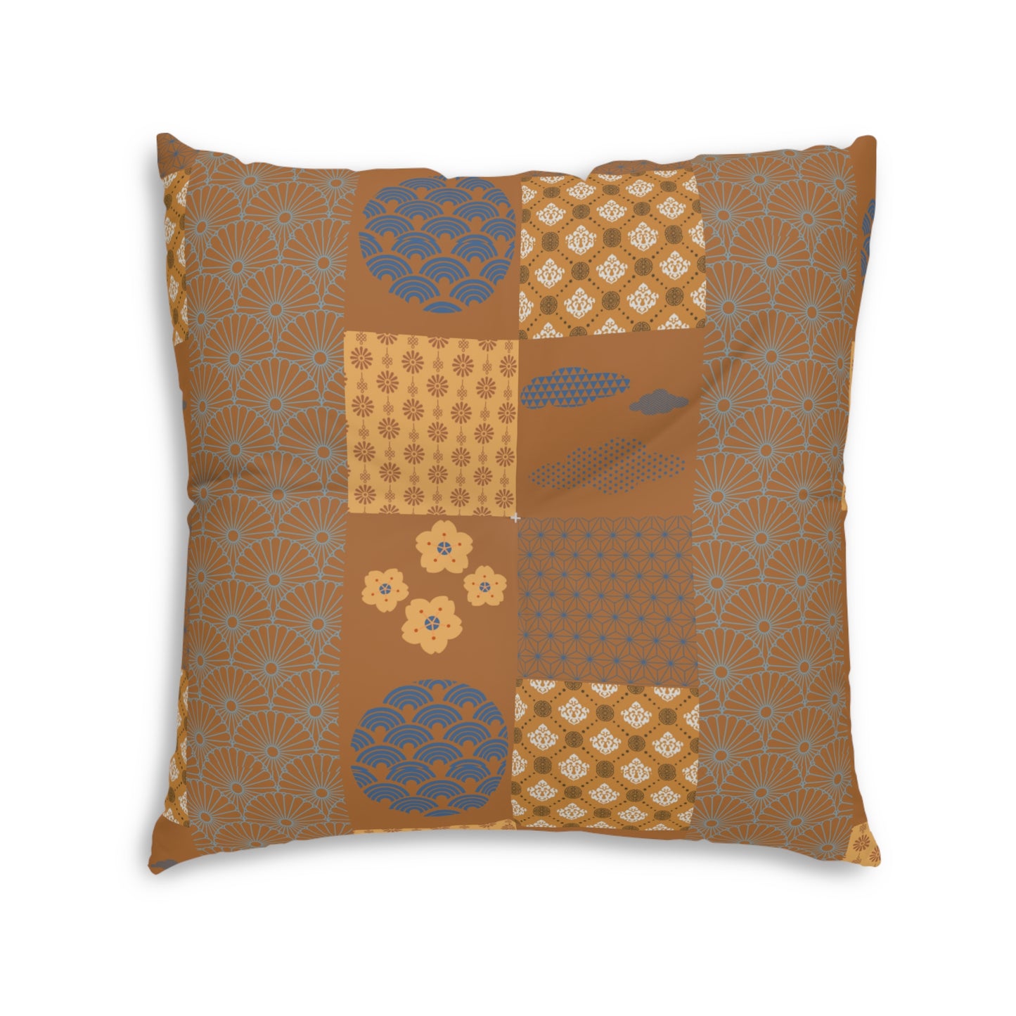 A square decorative throw pillow featuring a patchwork design of traditional Japanese-inspired patterns in warm brown, beige, and muted blue, shown against a plain white background.
