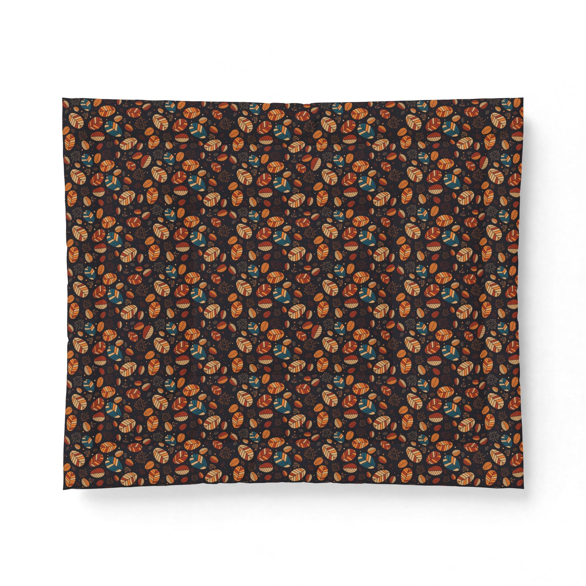 A rectangular fabric item, likely a blanket or pillow cover, featuring an all-over dense floral pattern in orange, brown, and teal on a dark charcoal background, shown against a plain white background.