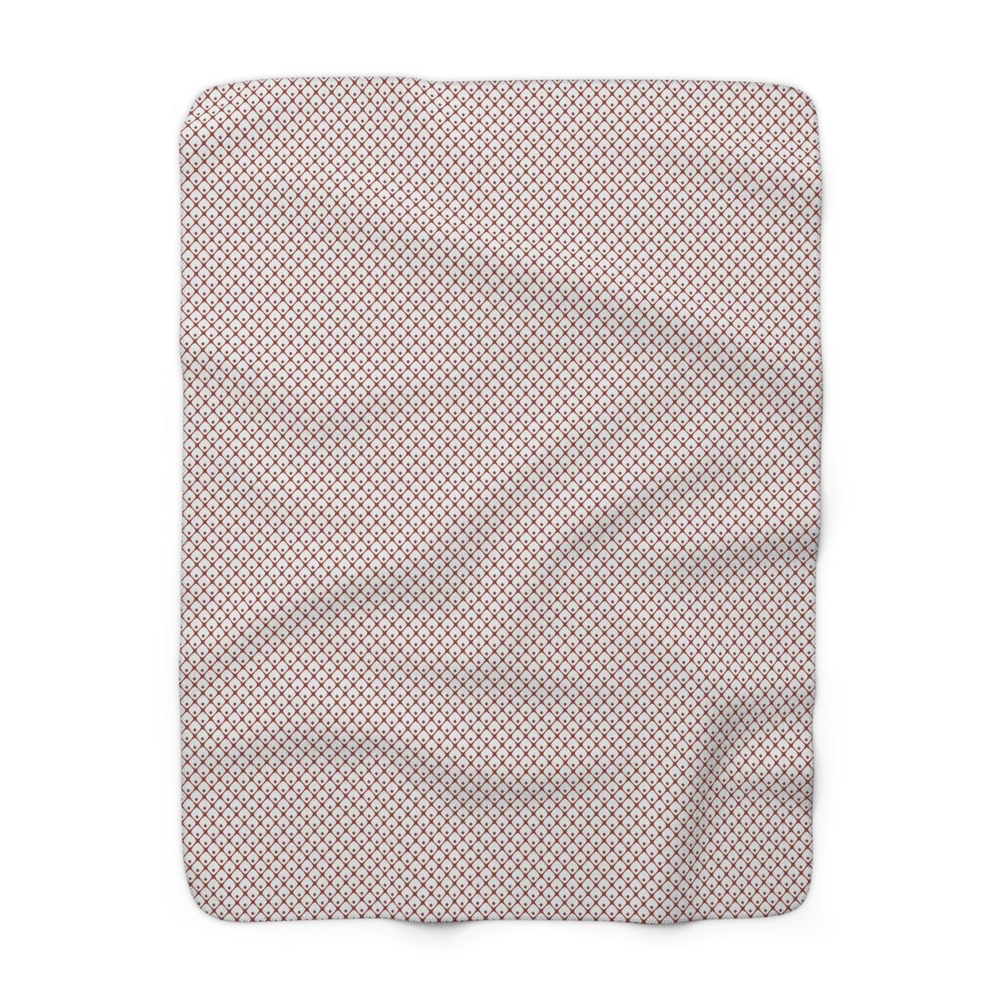 Gray blanket with white snowflake pattern on a white background