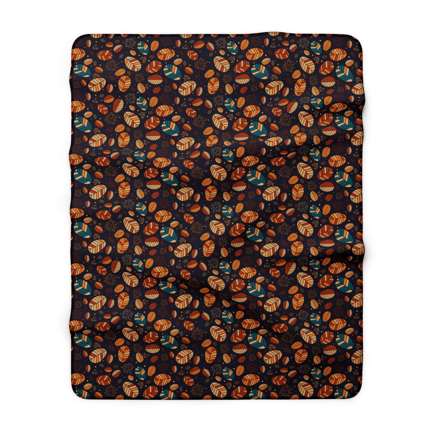 A rectangular throw blanket with a dense, all-over autumn pattern of orange and brown leaves, tan acorns, and teal birds on a very dark charcoal background, shown flat against a white background.