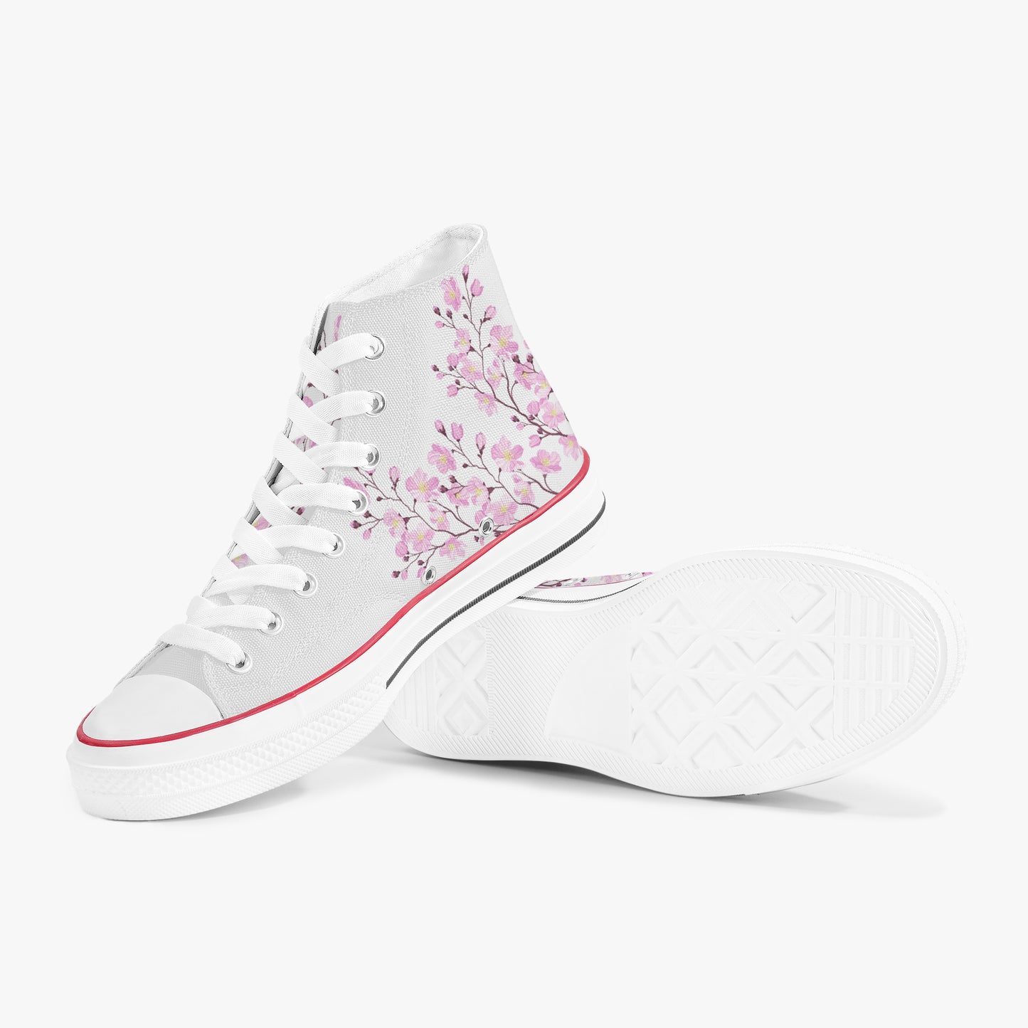 White high-top sneakers with pink floral design on a white background