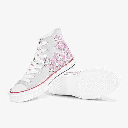White high-top sneakers with pink floral design on a white background