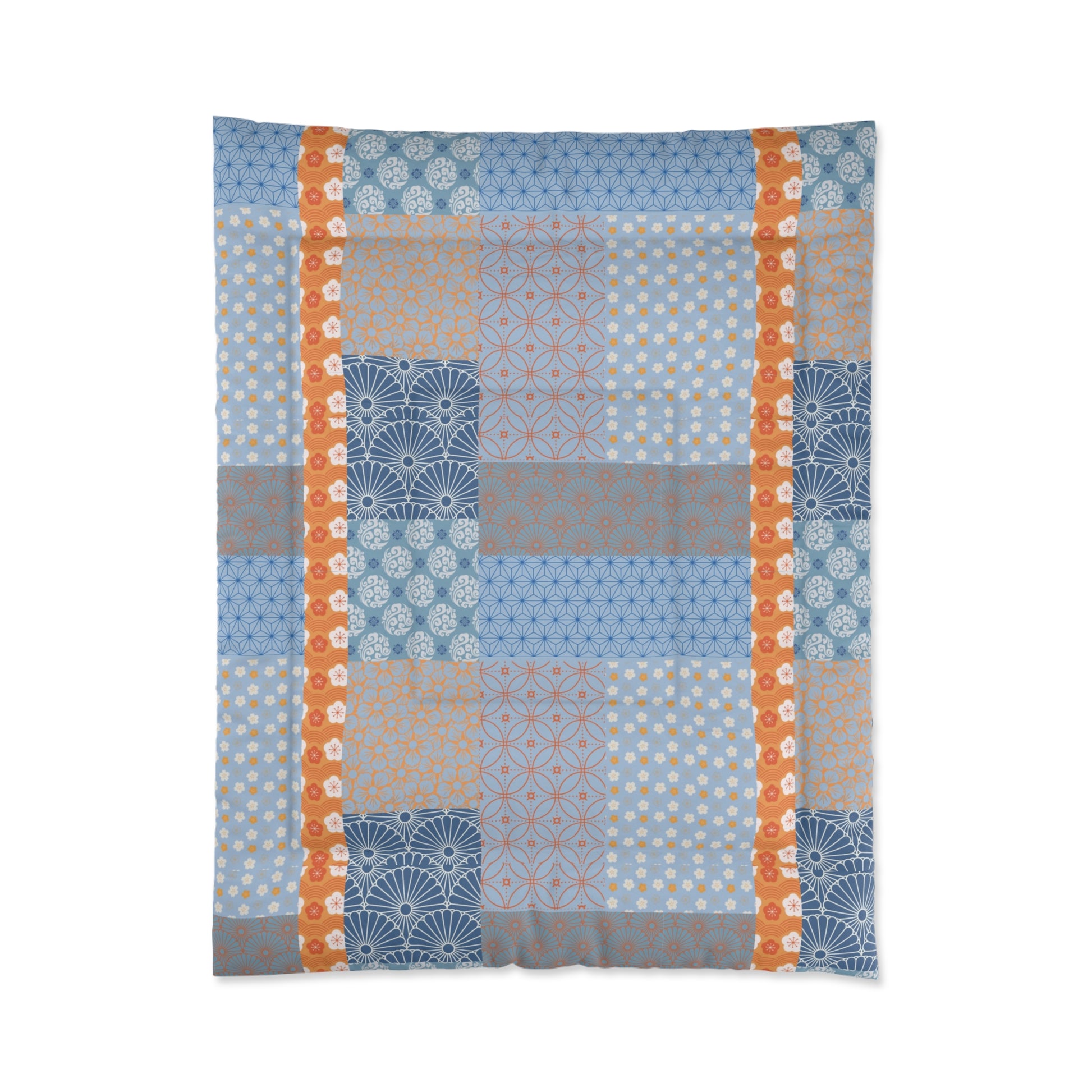 Patterned fabric with geometric designs in blue, orange, and gray on a white background