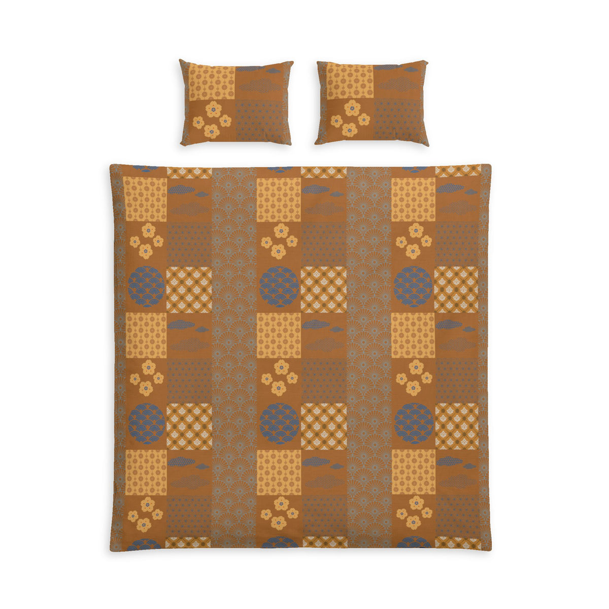 A bedding set featuring a patchwork quilt and two matching pillowcases with a Japanese-inspired pattern in shades of brown, beige, and muted blue-gray, shown on a plain white background.