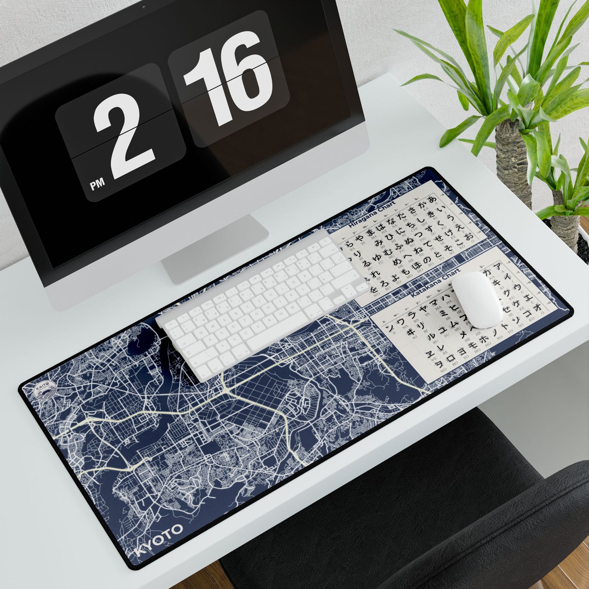 A large, dark blue and charcoal desk mat featuring a minimalist map of Kyoto’s street grid, styled for a professional home office environment.