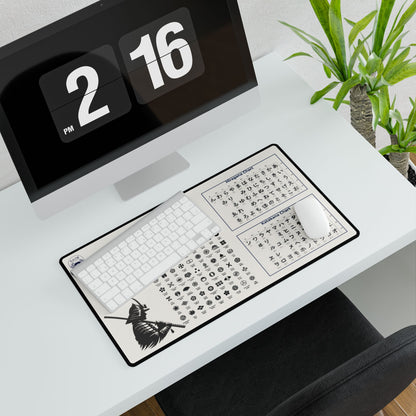 Desk setup with a keyboard and mouse pad featuring calligraphy designs, next to a digital clock displaying '2 PM' and '16'.