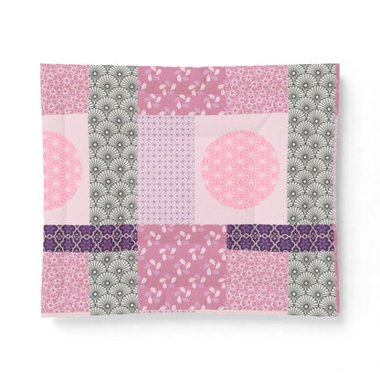 Patchwork pattern with pink, purple, and gray colors on a white background
