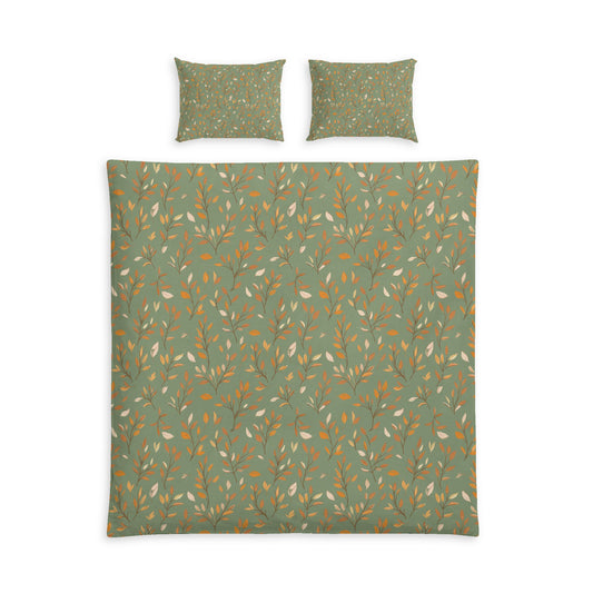 A bedding set featuring a duvet cover and two matching pillowcases, all in a deep red color with a repeating pattern of small white polka dots, shown against a plain white background.