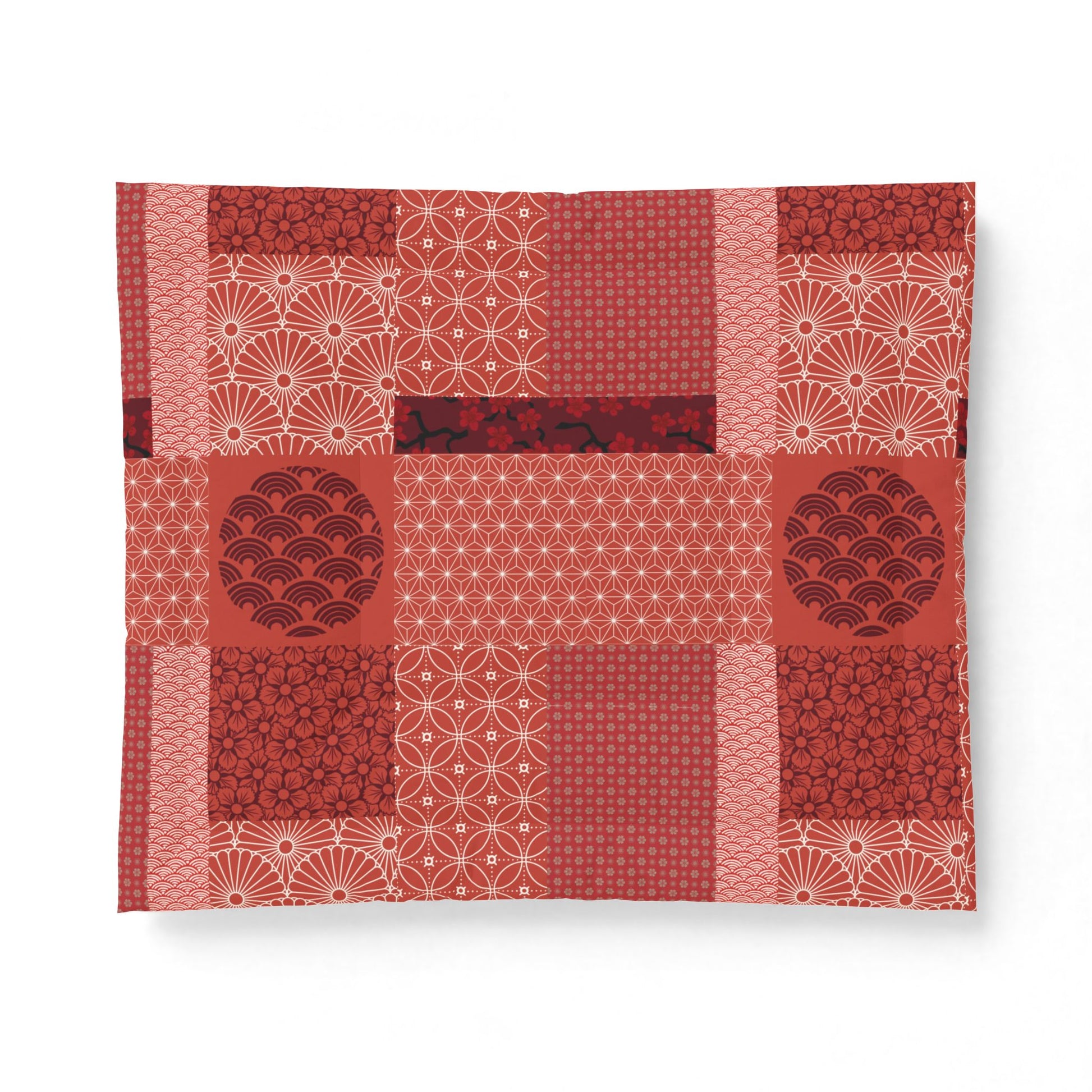 Red and white patterned fabric on a white background. Cotton Heritage