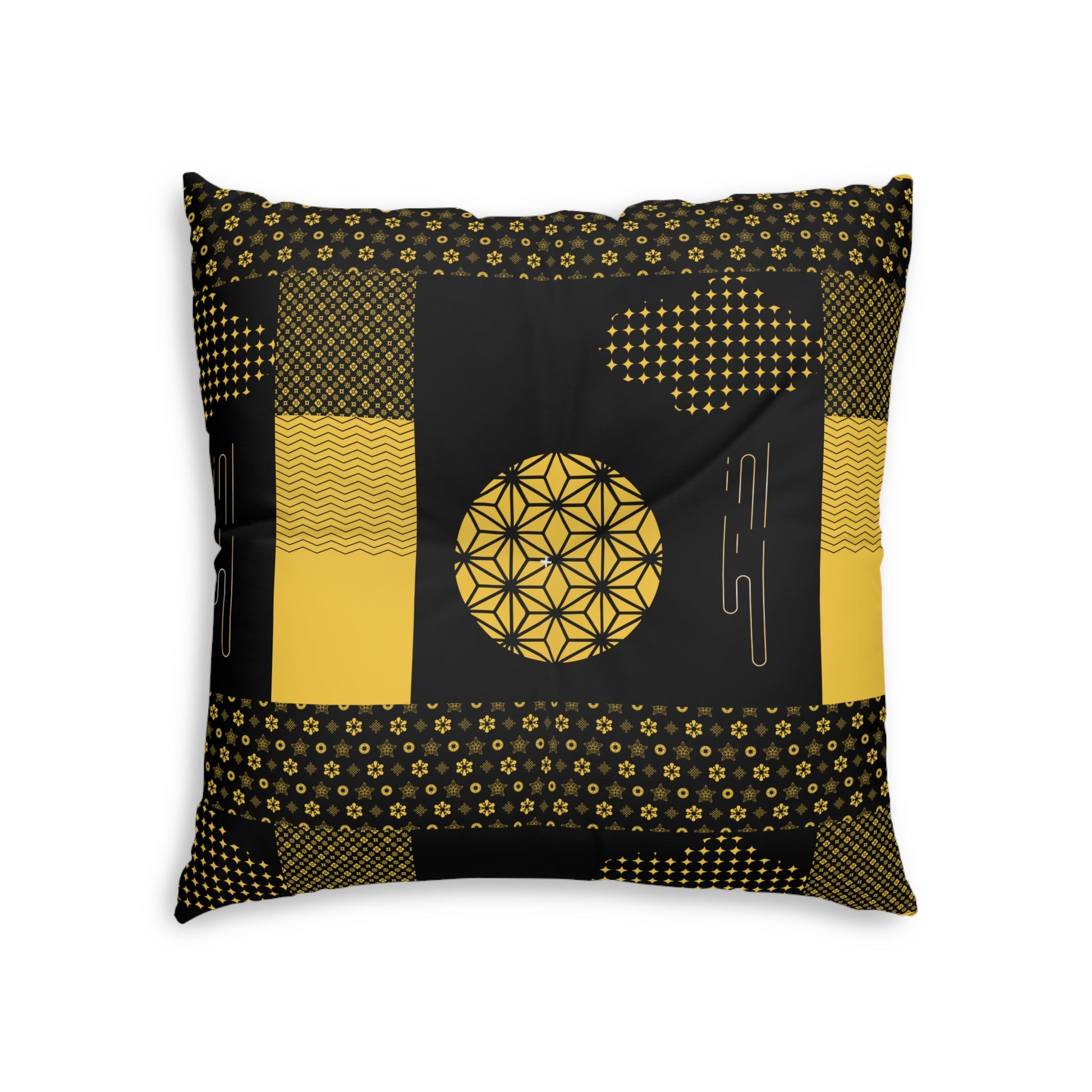 A square throw pillow featuring a modern geometric patchwork design in black and mustard yellow, displayed against a clean white background.