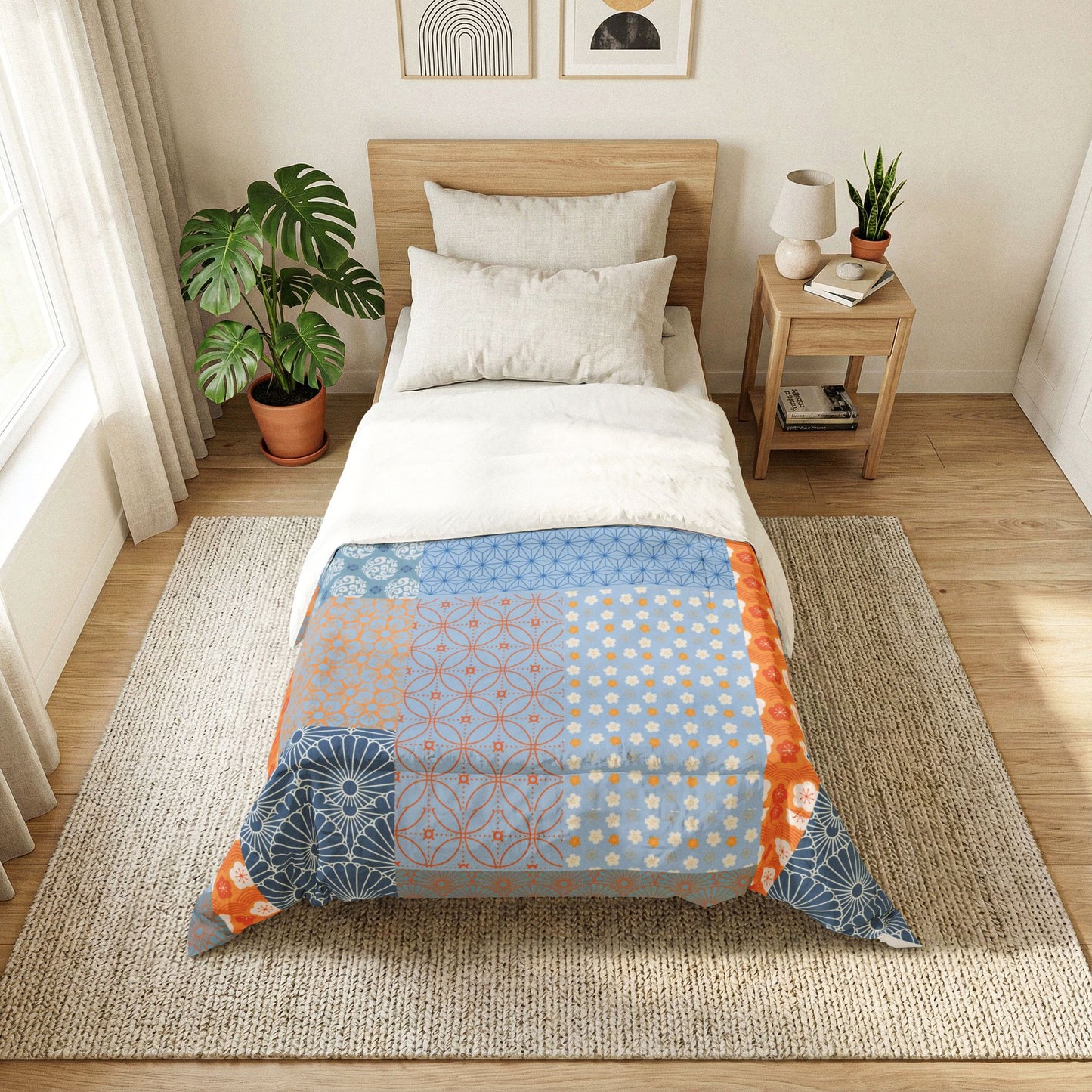 Bedroom with a bed featuring a colorful geometric patterned comforter, nightstand, and plants. Heritage Cotton