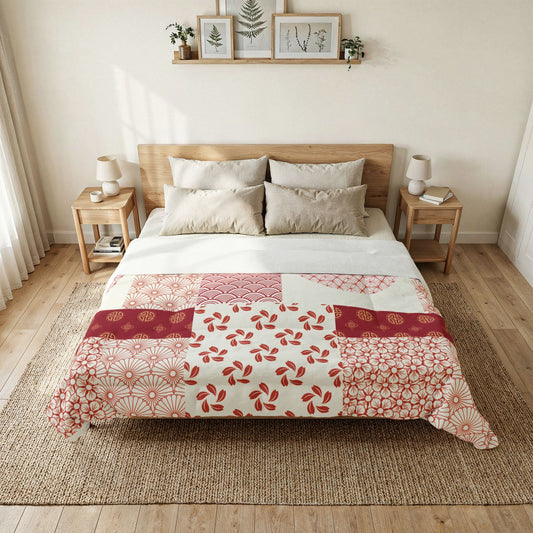 Bedroom with a bed featuring a patchwork quilt, wooden headboard, and side tables. Cotton Heritage