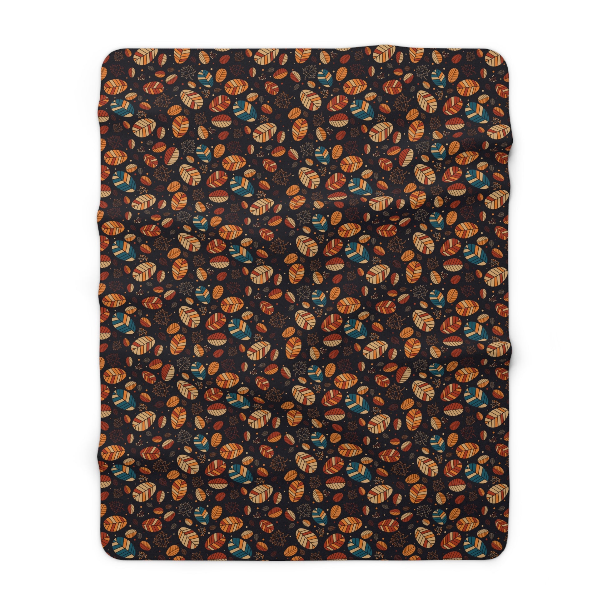 A rectangular throw blanket with a dark charcoal background covered in a dense, repeating pattern of illustrated pumpkins and gourds in orange, brown, and teal, shown flat against a solid white background.