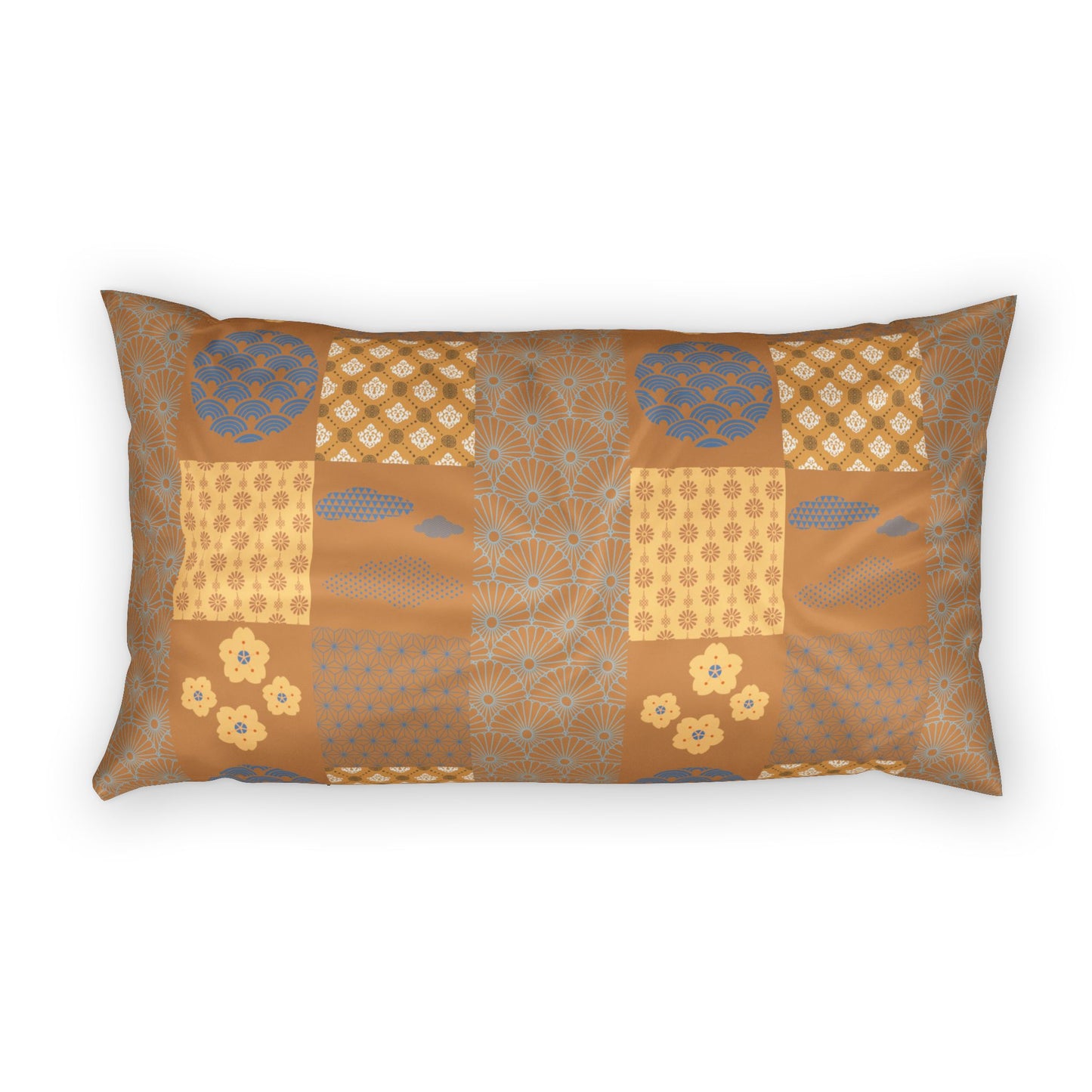 A rectangular lumbar pillow featuring a patchwork design of geometric and floral patterns in shades of brown, gold, beige, and muted blue, set against a plain white background.