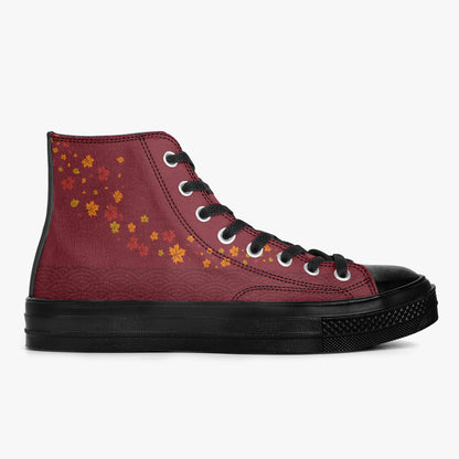 A high-top canvas sneaker in burgundy red with a pattern of small orange and yellow flowers on the side, featuring black laces, a black rubber toe cap, and a black sole, shown against a plain white background.