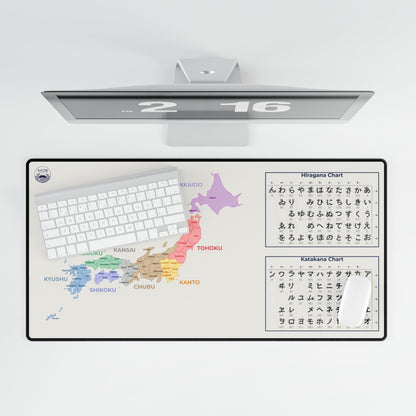 Computer monitor with a desk pad displaying a map and charts on a white background