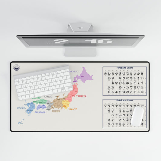 Computer monitor with a desk pad displaying a map and charts on a white background