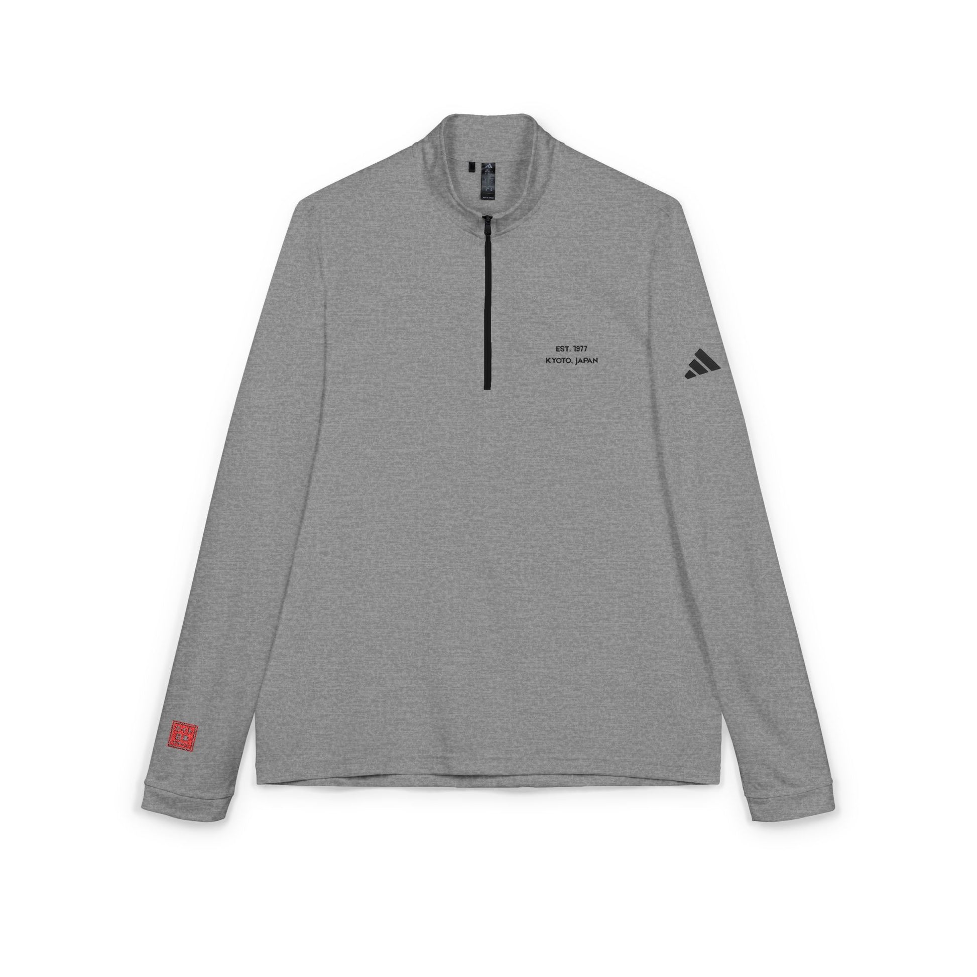 Gray long-sleeve athletic shirt with a zipper on a white background