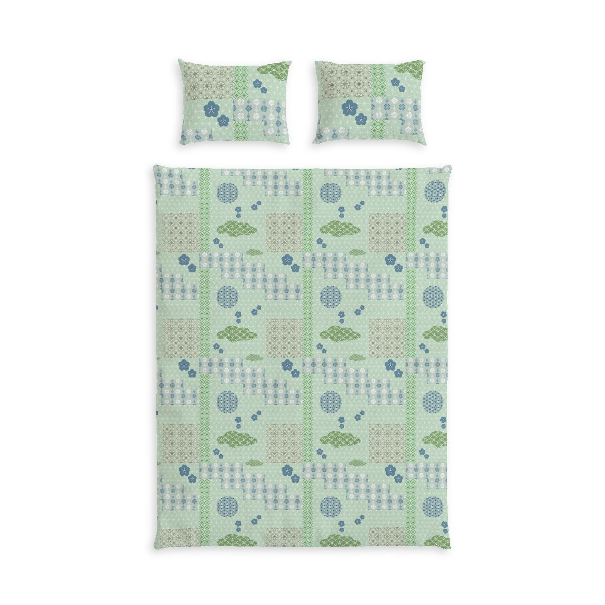A bedding set featuring a duvet cover and two matching pillowcases with a patchwork-style geometric pattern in sage green, light blue, and beige on a white background.