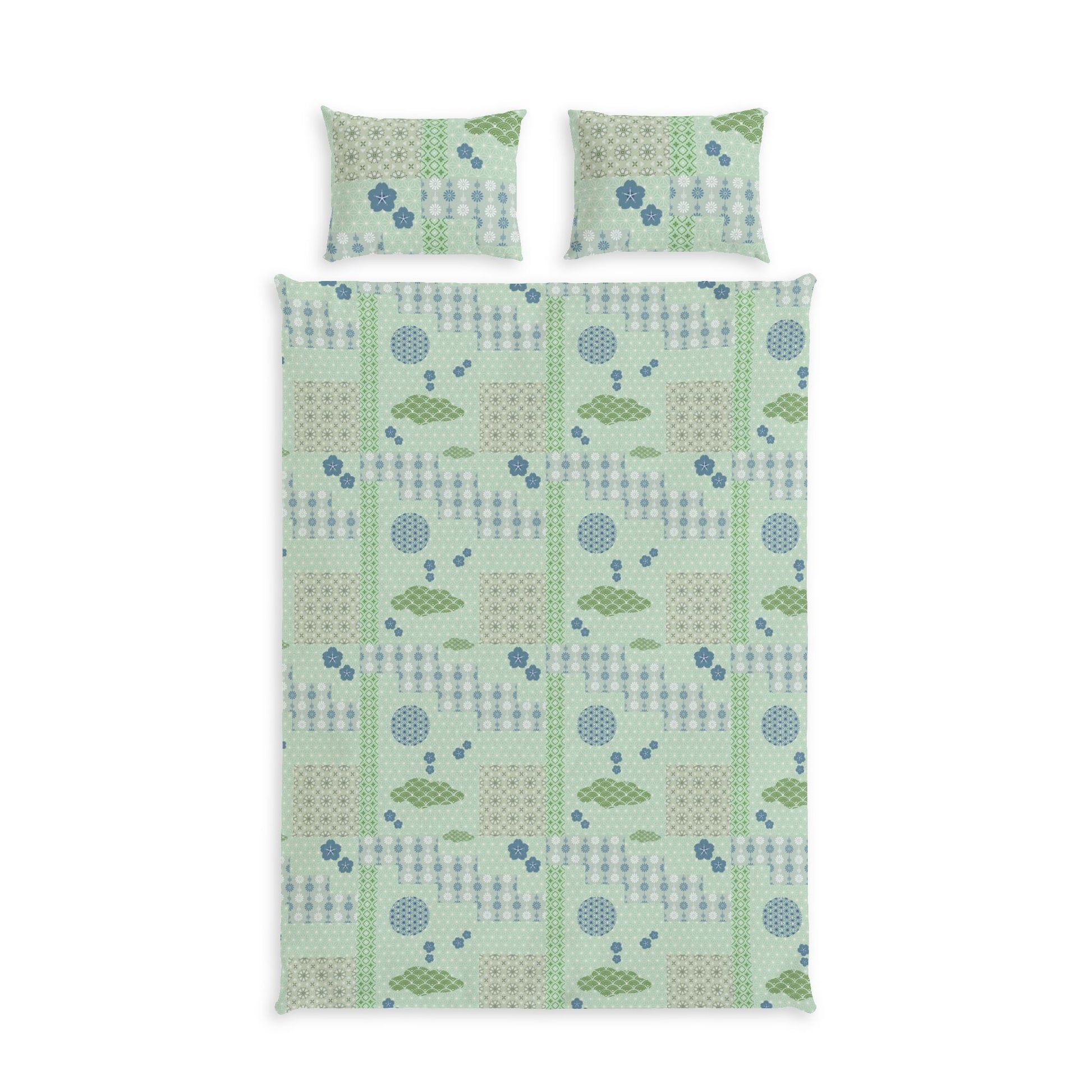 A bedding set featuring a duvet cover and two matching pillowcases with a light green and blue geometric pattern of trees, circles, and stripes, displayed on a solid white background.