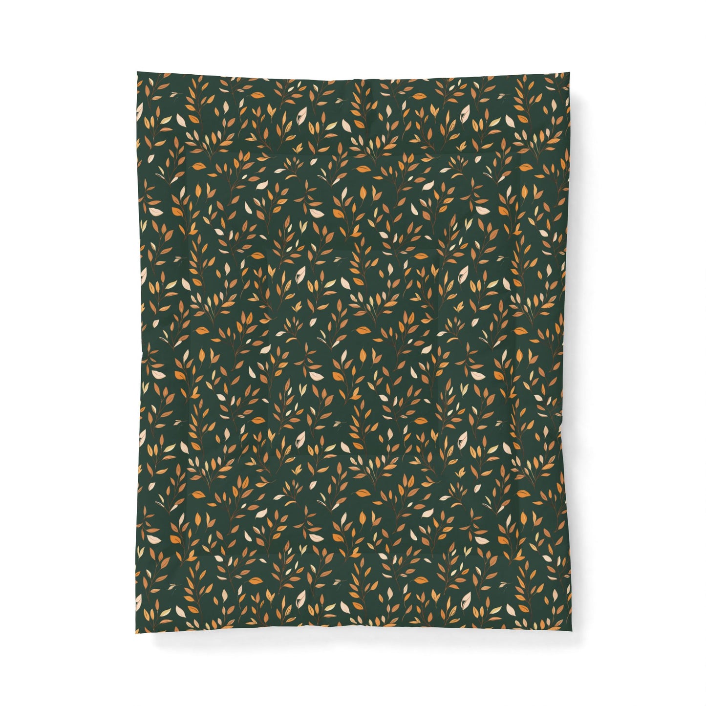 A rectangular fabric item, likely a blanket or throw, featuring an all-over repeating pattern of small leaves in warm tan, mustard, and cream on a dark forest green background.