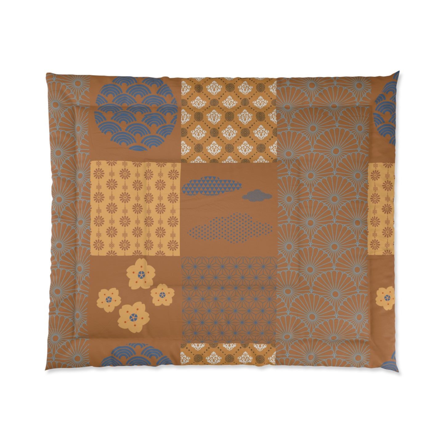 Patchwork patterned blanket with geometric and floral designs on a white background
