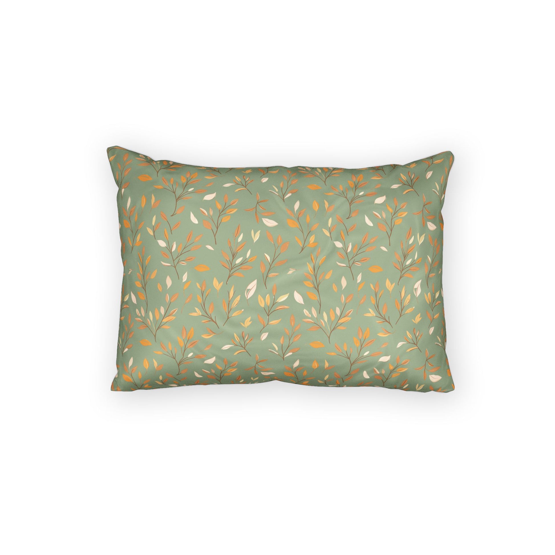 A rectangular throw pillow with a sage green background and a repeating pattern of delicate branches in mustard yellow and off-white, shown against a plain white background.